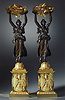 A superb pair of Empire gilt and patinated bronze five-light candelabra